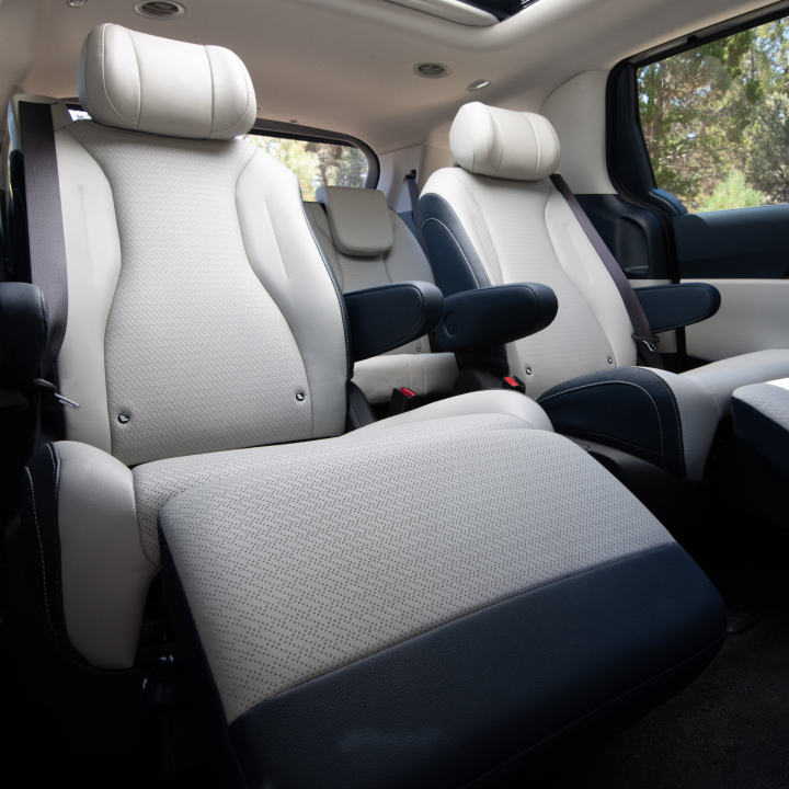 2025 Kia Carnival's spacious interior with second row reclining seats, three-quarter view